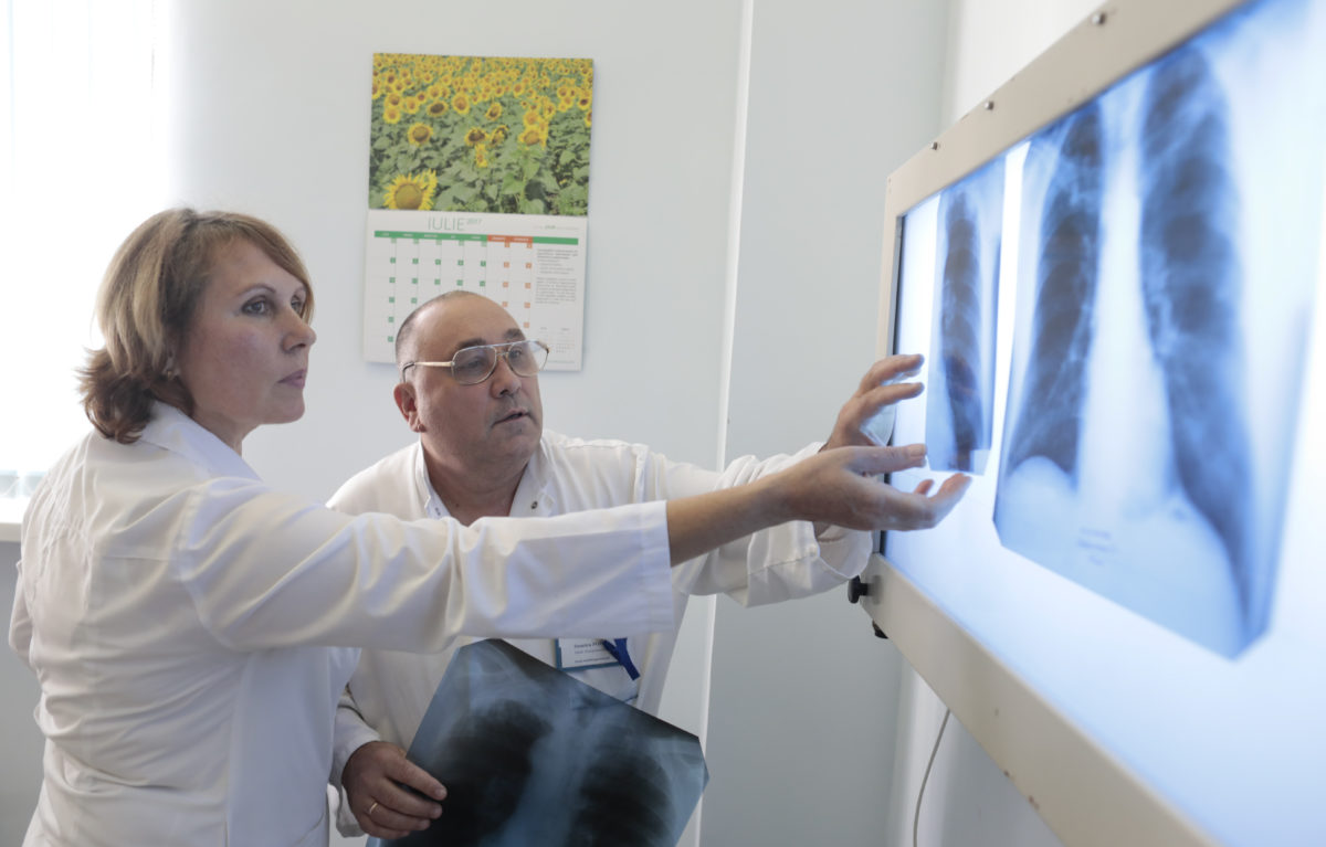 SVETLANA GHEORGHILAS and DIMITRI POPOV STREAM Physiology Medics during an interview the Institute of Physiopneumology "Chiril Draganiuc" during a STREAM trial and TB Treatment on July 2017. Chisinau, Moldava. (Photo/Javier Galeano)